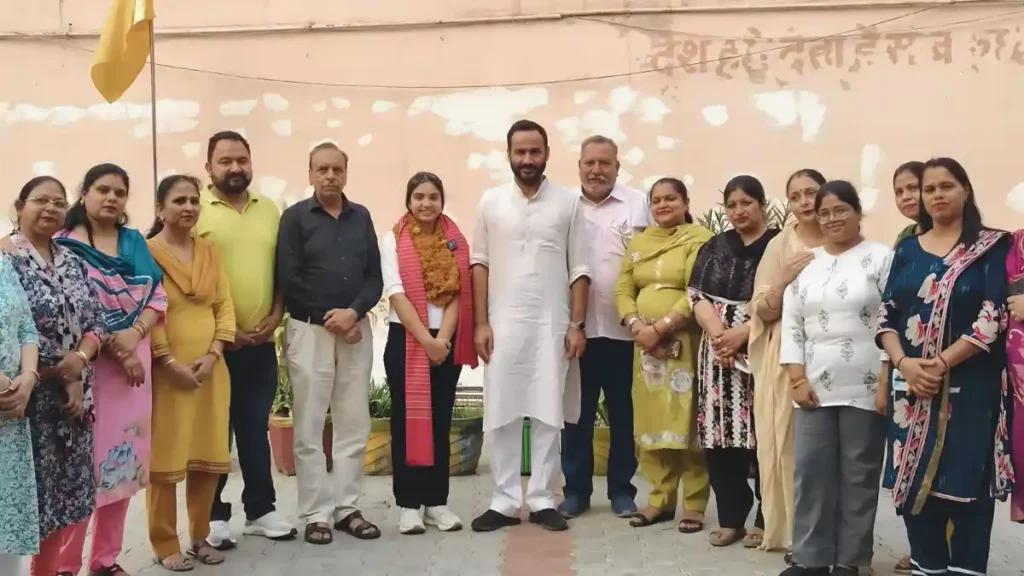 Harsirat Kaur—Punjab Board Topper, MP Meet Hayer Congratulates Her Harsirat Kaur stands with MP Meet Hayer and others as she is honored for topping the Punjab Board Class 12 exams.